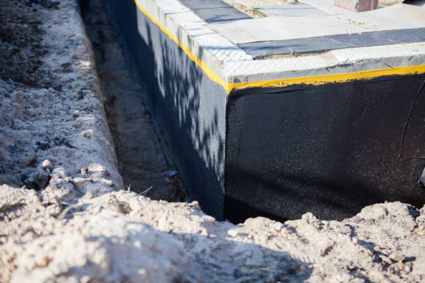 Professional Interior Drainage System technician working in Oakhurst, NJ